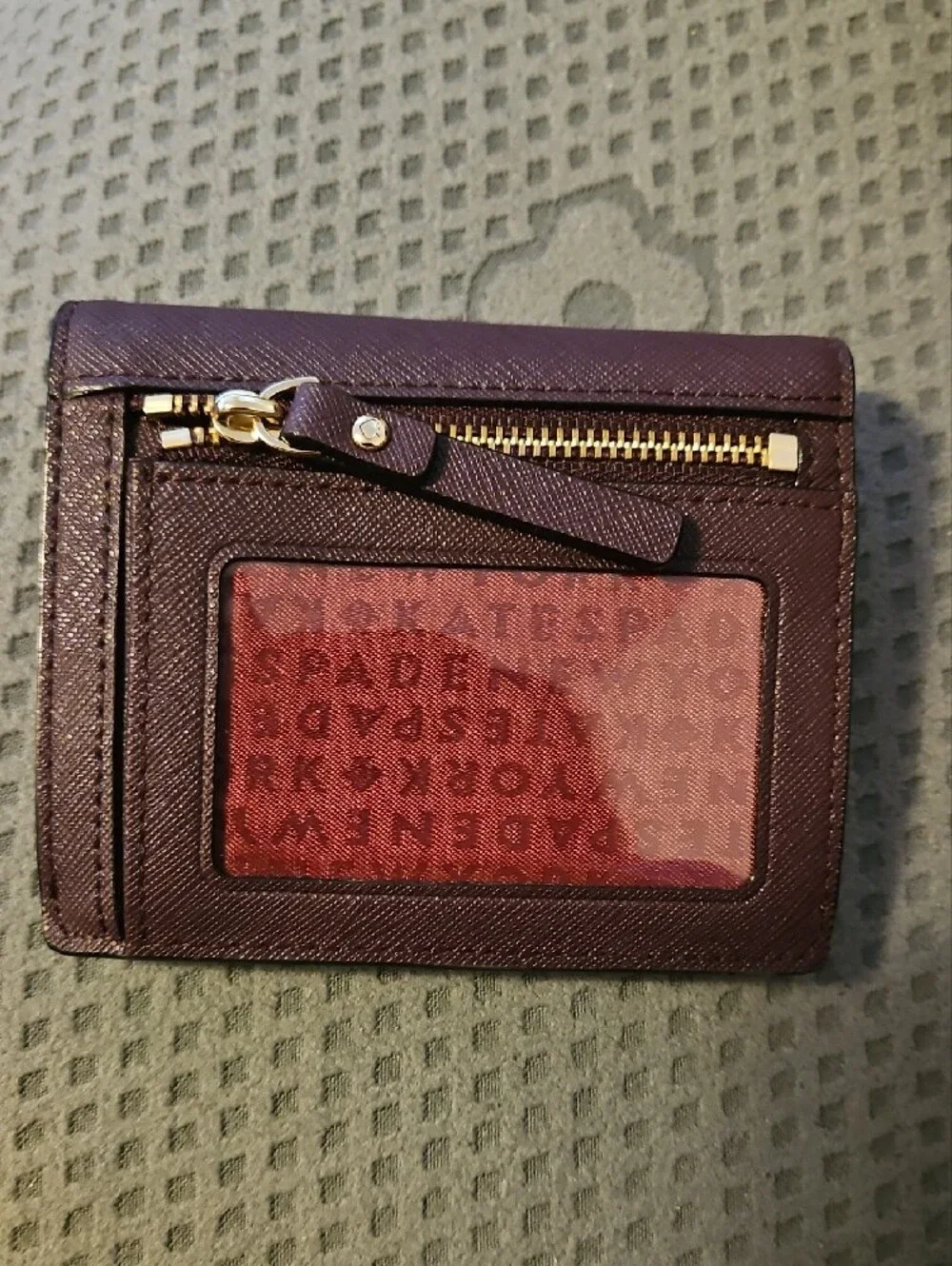 kate spade plum saffiano leather compact wallet with gold plaque